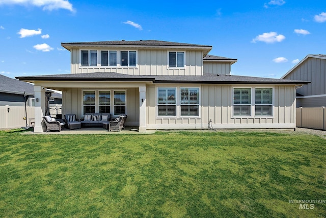 2245 N Burnam Ave, Star, ID 83669 - back of house featuring board and batten siding, fence, a yard, and an outdoor living space