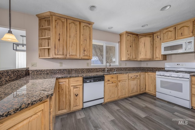 kitchen featuring decorative light fixtures, open shelves, dark wood-type flooring, a sink, and white appliances