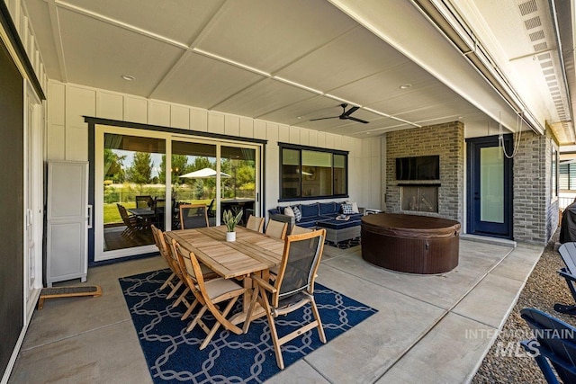 view of patio / terrace featuring a ceiling fan, outdoor dining space, and outdoor lounge area