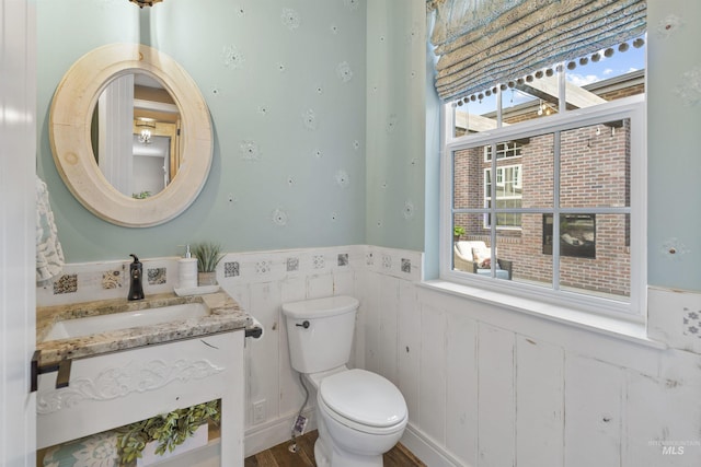 1747 N Tuscolano Ave, Eagle, ID 83616 - bathroom featuring a wainscoted wall and vanity