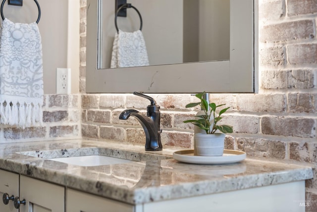 1747 N Tuscolano Ave, Eagle, ID 83616 - bathroom view of vanity and decorative backsplash