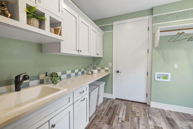 1747 N Tuscolano Ave, Eagle, ID 83616 - laundry area featuring cabinet space, dark wood-style flooring, and washer hookup