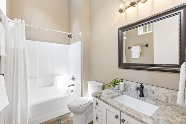 1747 N Tuscolano Ave, Eagle, ID 83616 - full bathroom featuring vanity, shower / bathtub combination with curtain, wood finished floors, and decorative backsplash
