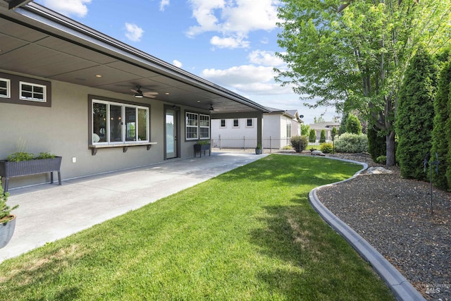 1747 N Tuscolano Ave, Eagle, ID 83616 - view of yard with ceiling fan and a patio