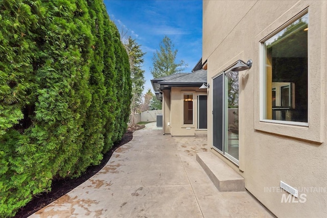 view of patio with fence