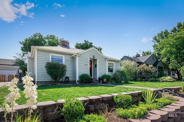907 3rd St, Lewiston, ID 83501 - view of front of home with a chimney and a front yard