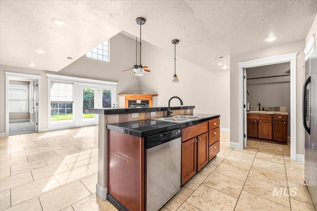 2476 S Amaya Ln, Boise, ID 83709 - kitchen with stainless steel dishwasher, a sink, a textured ceiling, a ceiling fan, and dark countertops