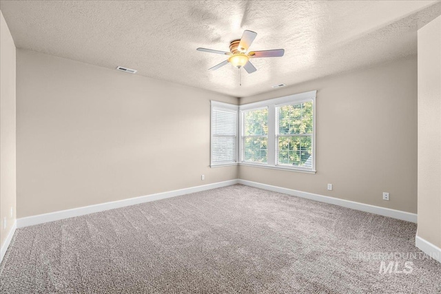 2476 S Amaya Ln, Boise, ID 83709 - empty room with a ceiling fan, carpet floors, baseboards, and a textured ceiling