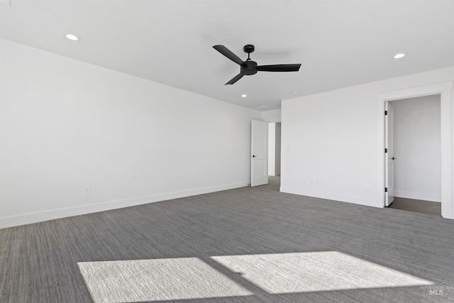 2358 E Monhegan Dr, Eagle, ID 83616 - spare room featuring dark colored carpet, a ceiling fan, recessed lighting, and baseboards