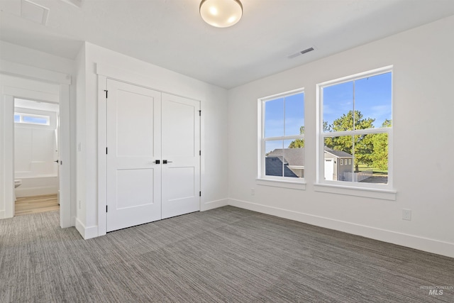 2358 E Monhegan Dr, Eagle, ID 83616 - unfurnished bedroom with carpet, baseboards, and a closet