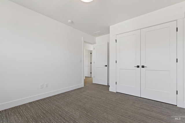 2358 E Monhegan Dr, Eagle, ID 83616 - unfurnished bedroom with carpet flooring, baseboards, and a closet