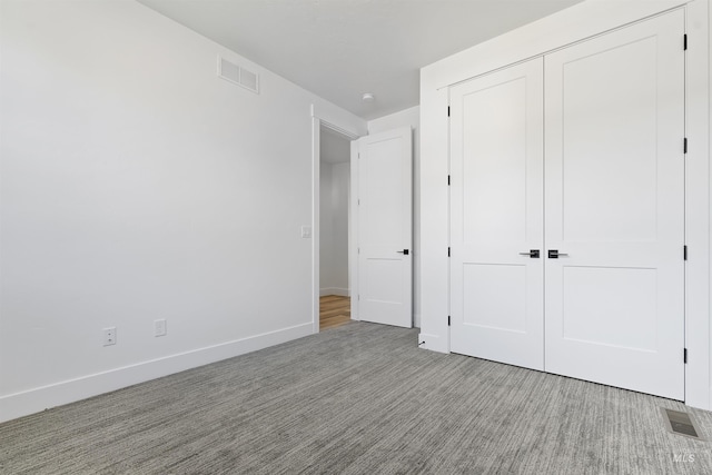 2358 E Monhegan Dr, Eagle, ID 83616 - unfurnished bedroom featuring a closet, baseboards, and carpet floors