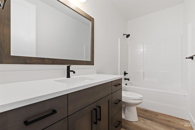 2358 E Monhegan Dr, Eagle, ID 83616 - bathroom with vanity, wood finished floors,  shower combination, and toilet