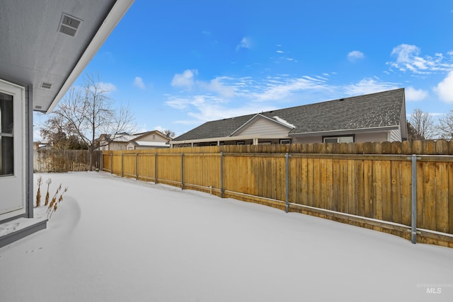 view of snowy yard