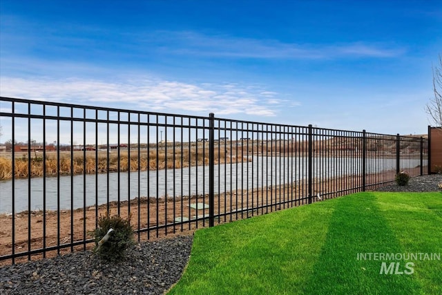 view of yard with a water view