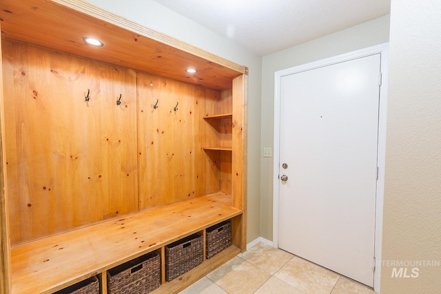 mudroom featuring light tile patterned floors