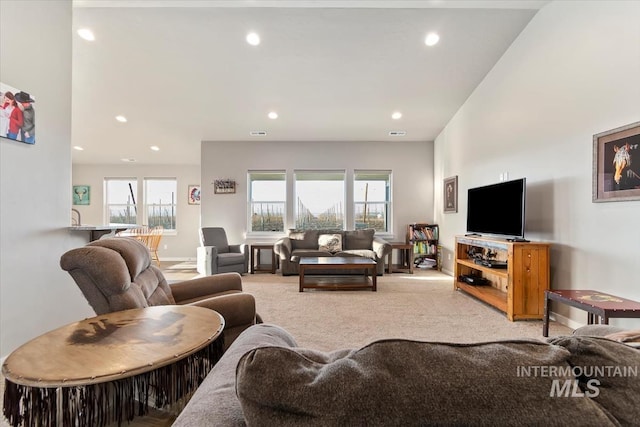22924 Fargo Rd, Parma, ID 83660 - living room with plenty of natural light, light carpet, baseboards, and recessed lighting