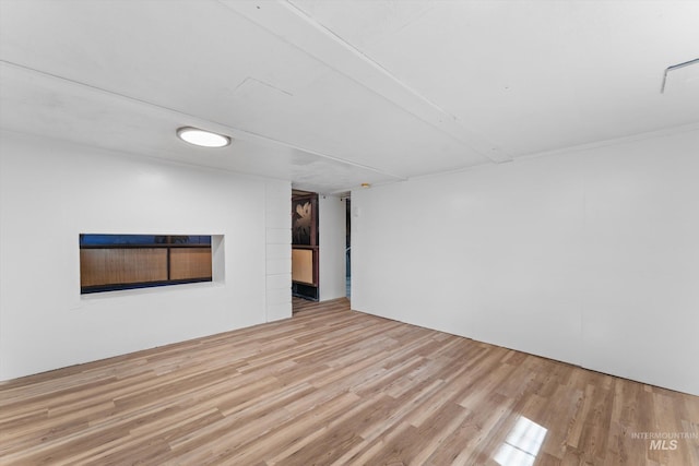 empty room featuring wood finished floors