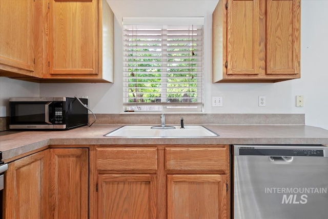 10795 W Susan St, Boise, ID 83713 - kitchen with appliances with stainless steel finishes and light countertops