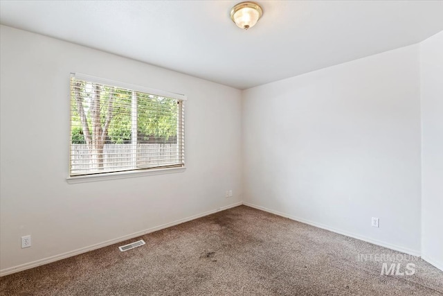 10795 W Susan St, Boise, ID 83713 - carpeted empty room featuring baseboards