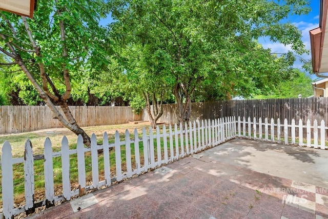 10795 W Susan St, Boise, ID 83713 - fenced backyard featuring a patio area