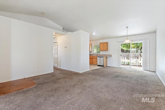 10795 W Susan St, Boise, ID 83713 - unfurnished living room featuring light colored carpet and vaulted ceiling