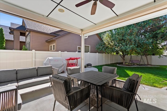 view of patio featuring ceiling fan, a fenced backyard, grilling area, an outdoor living space, and outdoor dining space