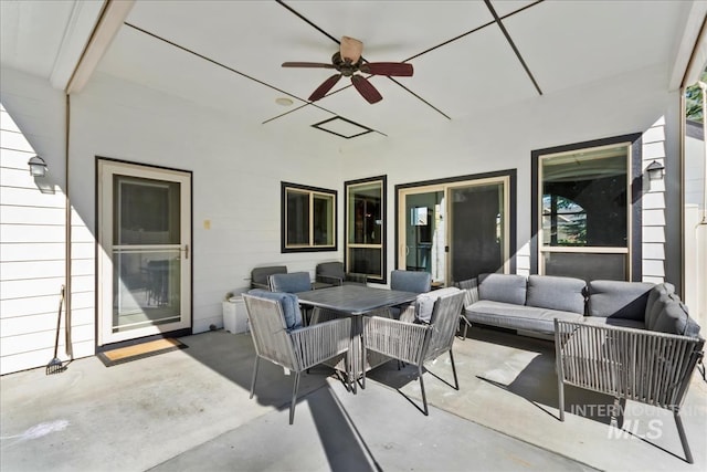 view of patio with a ceiling fan, outdoor dining area, and an outdoor living space