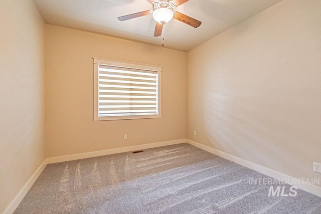 7053 W Butte Ln, Boise, ID 83704 - carpeted spare room featuring baseboards and ceiling fan