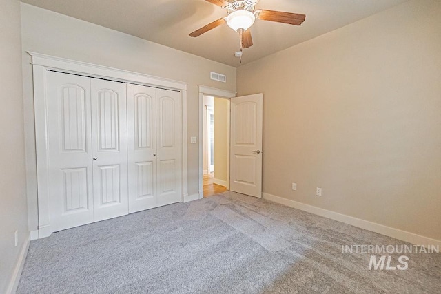 7053 W Butte Ln, Boise, ID 83704 - unfurnished bedroom featuring carpet flooring, baseboards, a closet, and a ceiling fan