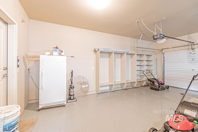 7053 W Butte Ln, Boise, ID 83704 - garage with freestanding refrigerator and a garage door opener