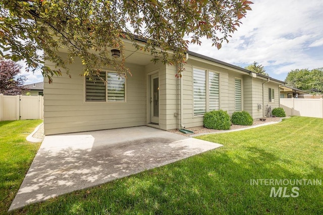 7053 W Butte Ln, Boise, ID 83704 - back of house with a patio