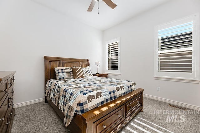 carpeted bedroom with ceiling fan