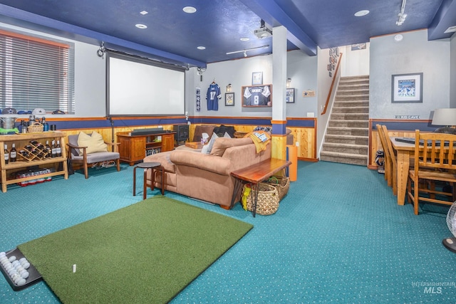 recreation room with a wainscoted wall, carpet, and recessed lighting