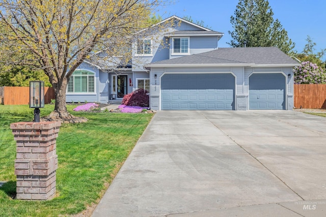 traditional home with driveway, a front yard, fence, an attached garage, and a shingled roof