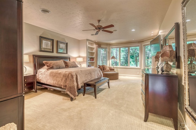 705 N Cobblestone Way, Eagle, ID 83616 - bedroom with light colored carpet, recessed lighting, ceiling fan, and a textured ceiling