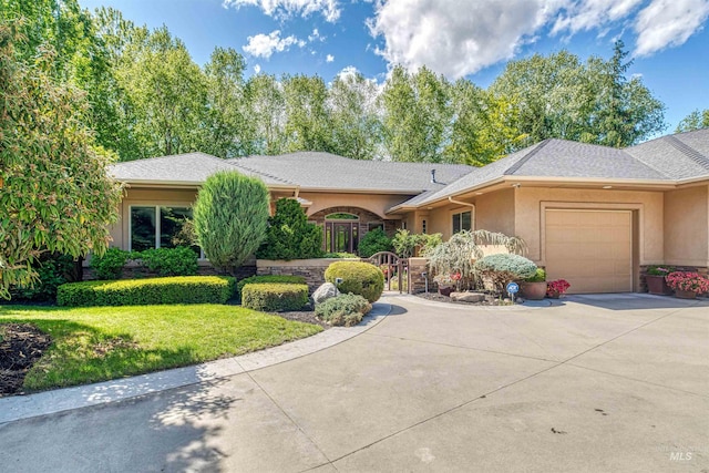 705 N Cobblestone Way, Eagle, ID 83616 - view of front facade featuring an attached garage, stucco siding, driveway, and a front lawn