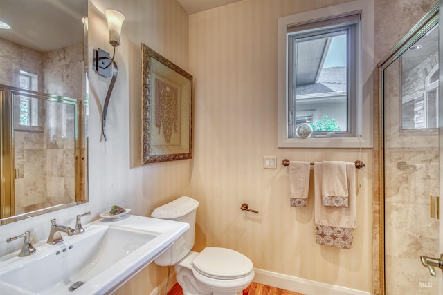 705 N Cobblestone Way, Eagle, ID 83616 - bathroom with a sink, healthy amount of natural light, toilet, and a shower stall