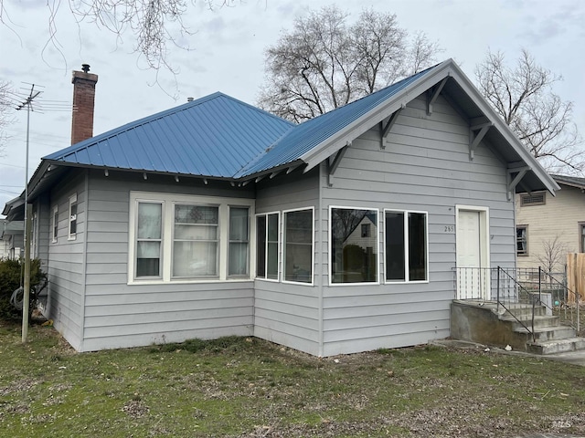 285 SW 3rd St, Ontario, OR 97914 - back of property with a chimney and metal roof