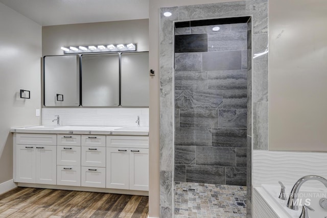 1113 W Blaine Ave, Nampa, ID 83651 - full bath with wood finished floors, double vanity, a sink, and walk in shower