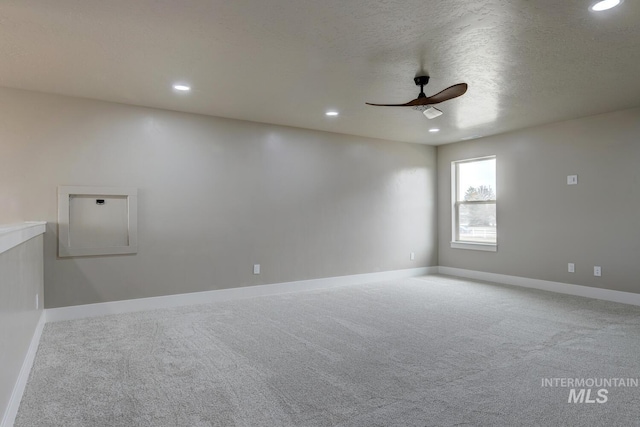 1113 W Blaine Ave, Nampa, ID 83651 - carpeted spare room with ceiling fan, recessed lighting, baseboards, and a textured ceiling