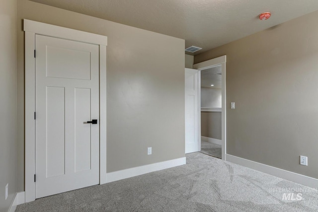 1113 W Blaine Ave, Nampa, ID 83651 - unfurnished bedroom featuring visible vents, baseboards, and carpet floors