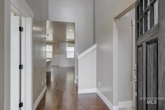 1113 W Blaine Ave, Nampa, ID 83651 - hallway with baseboards and wood finished floors