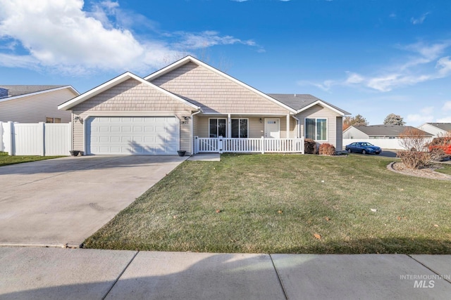 single story home featuring a porch, a garage, and a front lawn