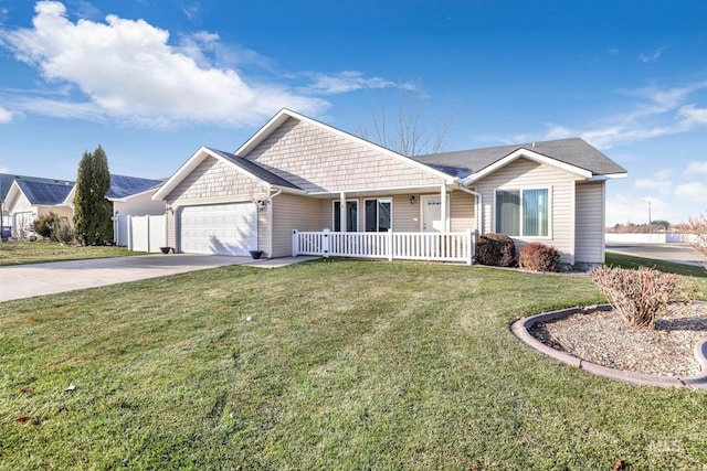 single story home with covered porch, a garage, and a front lawn