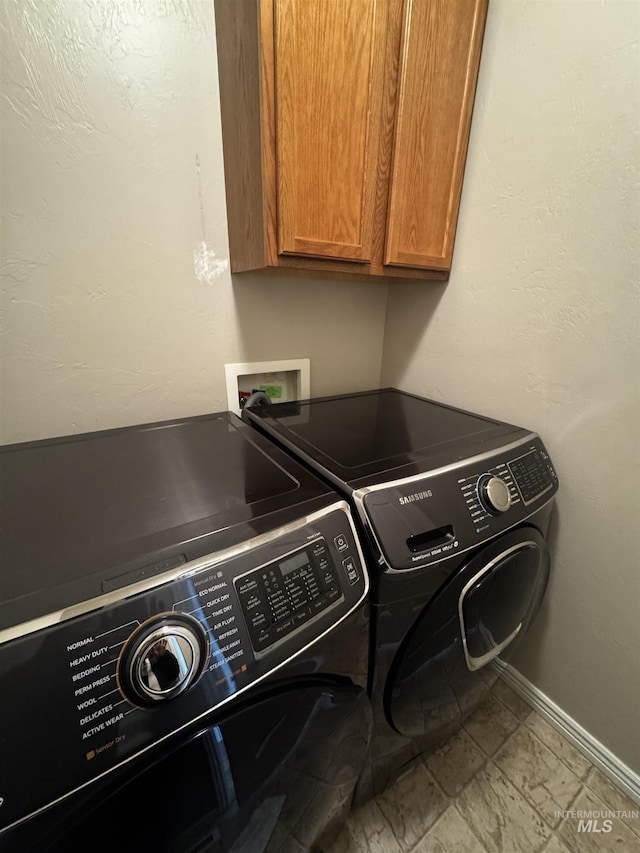 1173 Knoll Ridge Rd, Twin Falls, ID 83301 - laundry area with cabinet space, independent washer and dryer, and baseboards