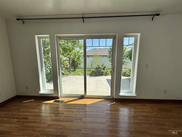 1173 Knoll Ridge Rd, Twin Falls, ID 83301 - doorway featuring wood finished floors and baseboards