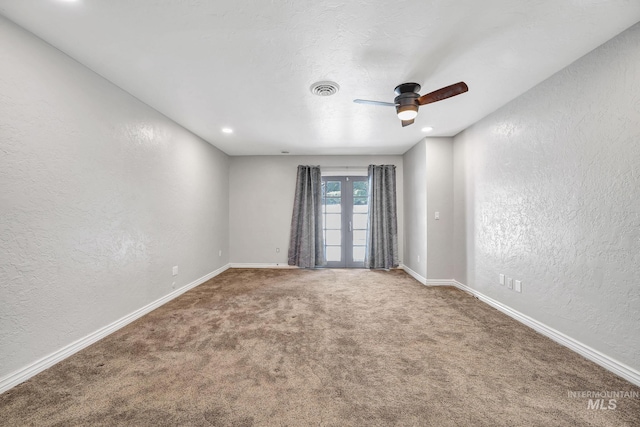 790 Academic Dr, Twin Falls, ID 83301 - carpeted empty room featuring a textured wall, baseboards, a ceiling fan, and visible vents