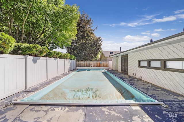 790 Academic Dr, Twin Falls, ID 83301 - view of swimming pool featuring a fenced backyard, a fenced in pool, and a patio