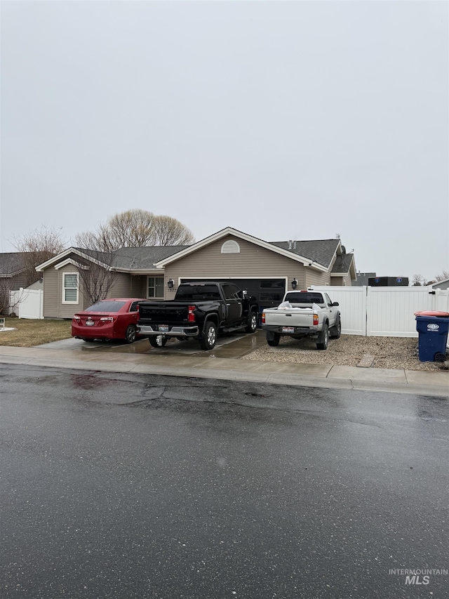 view of front of property featuring a garage